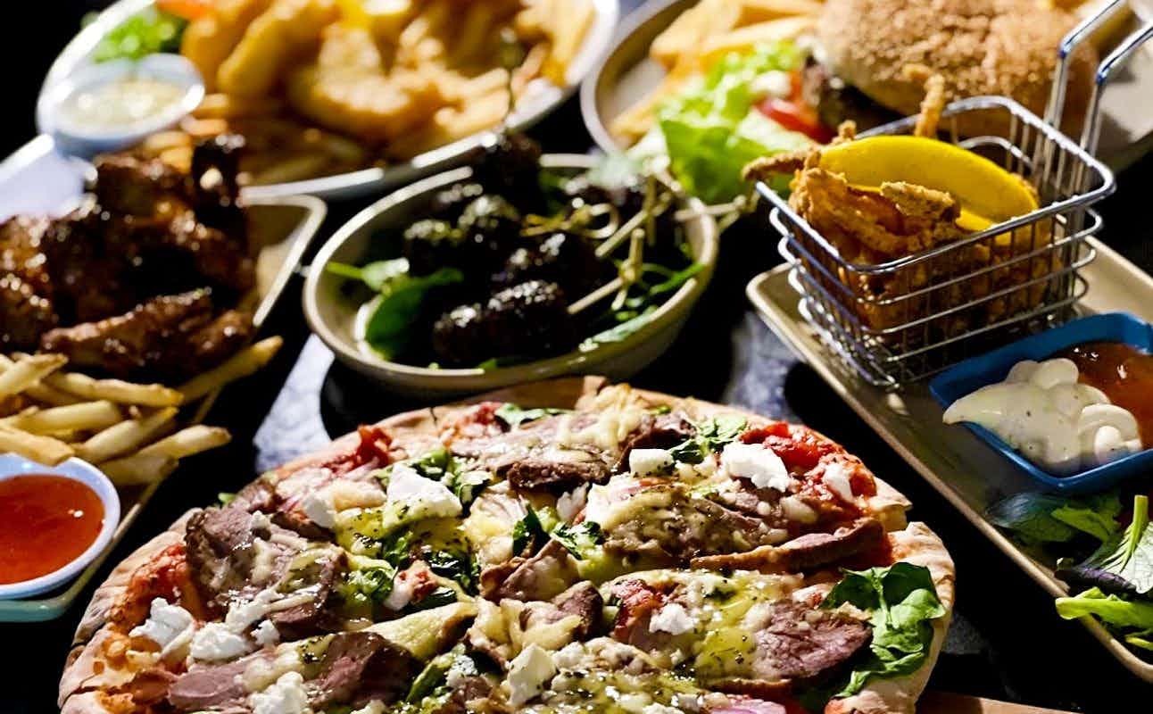 Enjoy Pizza, Small Plates, Vegetarian options, Restaurant, Indoor & Outdoor Seating and $$$ cuisine at Pinchos Restaurant & Pizzeria in Orakei, Auckland