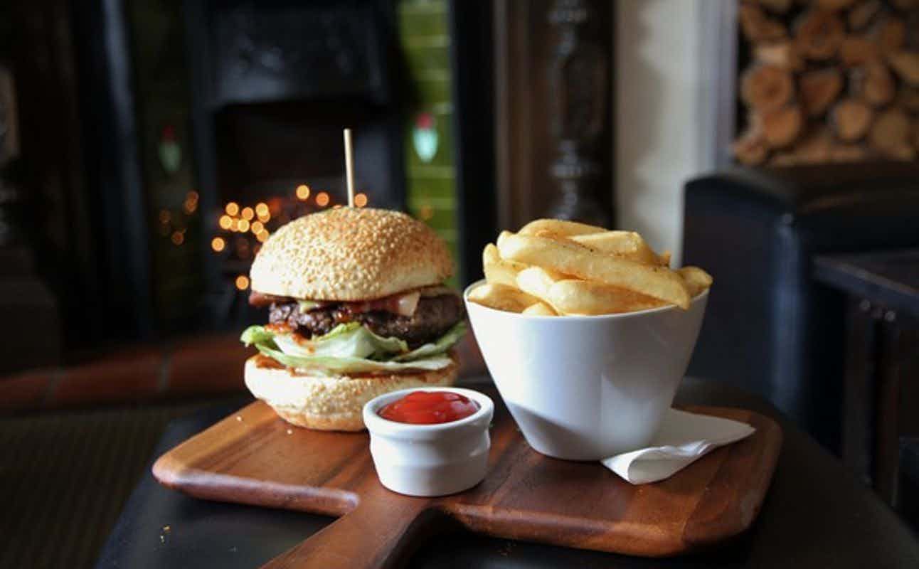 Enjoy American, Pizza, Gluten Free Options, Bars & Pubs, Sports Bar, Indoor & Outdoor Seating, $$$ and Groups cuisine at The Paddington in Parnell, Auckland