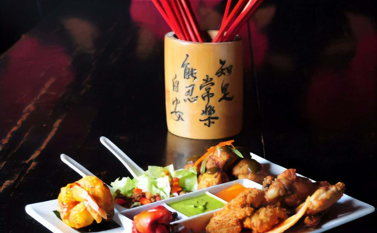 Enjoy Asian, Indian, Thai, Vegetarian options, Bars & Pubs, Restaurant, Free Wifi, Wheelchair accessible, Highchairs available, Private Dining, Table service and $$$ cuisine at Monsoon Poon in Downtown Auckland, Auckland